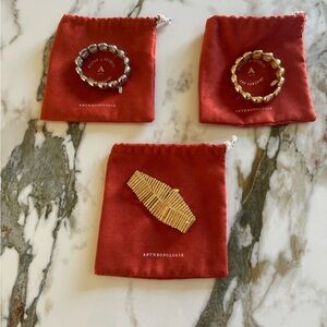 3 Anthropology stretch bracelets gold and silver